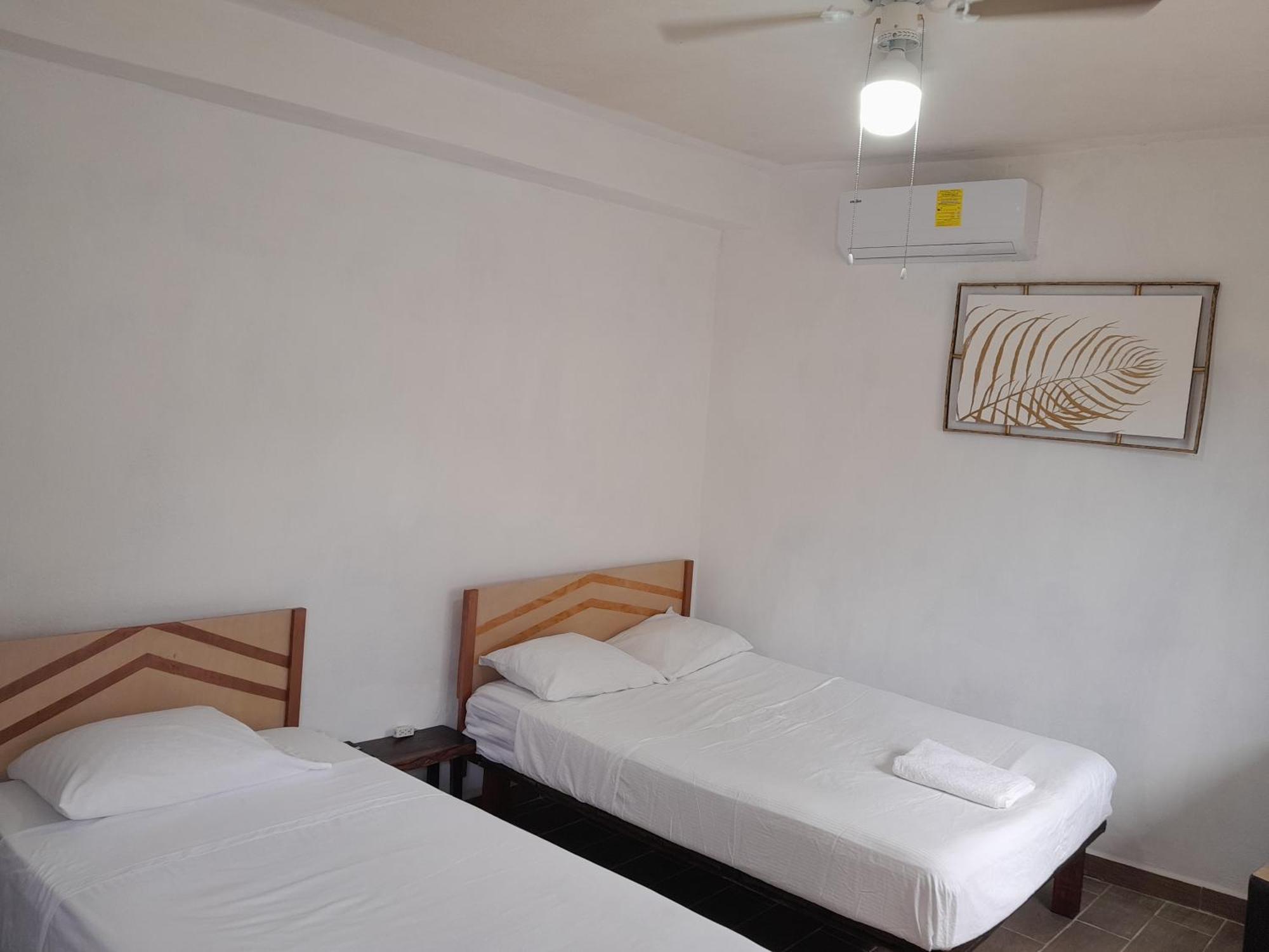 Chambre Triple avec Salle de Bains Privative
